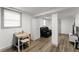 Basement living area with table, chairs, and leather couch at 1283 Woodleigh Sw Rd, Marietta, GA 30008