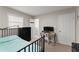 Spacious bedroom with full-size bed and home office at 1283 Woodleigh Sw Rd, Marietta, GA 30008