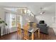 Bright dining area with hardwood floors and large windows at 1283 Woodleigh Sw Rd, Marietta, GA 30008