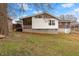 Back of house, deck, and fenced backyard at 1283 Woodleigh Sw Rd, Marietta, GA 30008