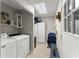 Laundry room with washer, dryer, and extra storage at 1283 Woodleigh Sw Rd, Marietta, GA 30008