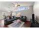 Bright living room with hardwood floors and a ceiling fan at 1283 Woodleigh Sw Rd, Marietta, GA 30008