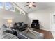 Comfortable living room featuring hardwood floors and large windows at 1283 Woodleigh Sw Rd, Marietta, GA 30008