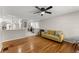 Living room with hardwood floors and a view to the kitchen at 1283 Woodleigh Sw Rd, Marietta, GA 30008