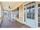 Front porch with rocking chairs and light blue door at 976 Arthur Nw Ln, Atlanta, GA 30318