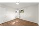 Well-lit bedroom featuring wood-look floors and large window at 2299 Beaver Creek Se Rd, Smyrna, GA 30080