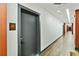 Apartment hallway with wood floors and modern doors at 112 Rogers Ne St # 505, Atlanta, GA 30317