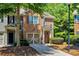 Townhouse exterior with landscaping and driveway at 1414 Dolcetto Nw Trce # 14, Kennesaw, GA 30152