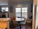 Bright dining room with hardwood floors and an oval wooden dining table at 655 Mead St # 28, Atlanta, GA 30312