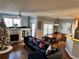 Spacious living room with hardwood floors, fireplace, and ample seating at 655 Mead St # 28, Atlanta, GA 30312