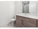 Modern bathroom with single vanity, marble tile floors, and a shower at 1241 Chelsea Nw Cir, Atlanta, GA 30318