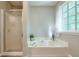 Bathroom with garden tub and separate shower at 1131 Brogdon Dr, Powder Springs, GA 30127