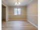 Bright dining area with neutral walls and wood-look floors at 3436 Lake Monroe Rd, Douglasville, GA 30135