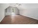 Large bedroom with vaulted ceiling, built-in shelves, and hardwood floors at 695 Old Johnson Rd, Lawrenceville, GA 30045