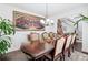 Elegant dining room featuring a large table and ornate artwork at 1178 Fort Marcy Park, Lawrenceville, GA 30044