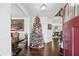 Bright entryway with hardwood floors, Christmas tree, and formal dining area at 1178 Fort Marcy Park, Lawrenceville, GA 30044