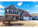 Two-story home with a three car garage, brick facade, and front yard at 1178 Fort Marcy Park, Lawrenceville, GA 30044