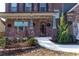 Front porch with brick columns, festive decor, and landscaping at 1178 Fort Marcy Park, Lawrenceville, GA 30044