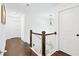 Bright hallway with hardwood floors and elegant staircase at 1178 Fort Marcy Park, Lawrenceville, GA 30044
