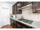 Kitchen with gas cooktop and granite countertops at 1178 Fort Marcy Park, Lawrenceville, GA 30044