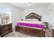 Main bedroom with large bed and nightstand at 1178 Fort Marcy Park, Lawrenceville, GA 30044