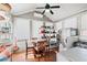 Sunroom with table and chairs, and ample storage shelving at 1178 Fort Marcy Park, Lawrenceville, GA 30044