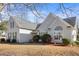 House exterior showcasing gray siding and landscaping at 5642 Little Mill Pkwy, Buford, GA 30518