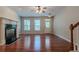 Spacious living room with hardwood floors and fireplace at 4404 Village Field Pl, Suwanee, GA 30024