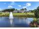 Pond with fountain and manicured landscaping at 7 Hickory Branch, Hiram, GA 30141