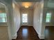 Bright entryway with hardwood floors and a view into other rooms at 1999 Gladys Ct, Marietta, GA 30064