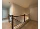 Upstairs hallway with access to bedrooms and bathrooms at 1999 Gladys Ct, Marietta, GA 30064