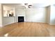 Spacious living room featuring hardwood floors and a fireplace at 2104 Meadow Peak Rd, Duluth, GA 30097