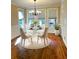 Bright dining room with hardwood floors and chandelier at 500 Poplar Creek Xing, Canton, GA 30114