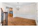 Formal dining room with hardwood floors and kitchen view at 500 Poplar Creek Xing, Canton, GA 30114