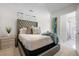 Spacious bedroom with plush bed and en-suite bathroom access at 150 Hampton Cir, Mcdonough, GA 30253