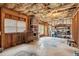 Unfinished basement with storage shelves and boxes at 3215 Kylee Dawn Cir, Lawrenceville, GA 30045