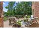 Spacious deck with comfortable seating and a wooded view at 3215 Kylee Dawn Cir, Lawrenceville, GA 30045