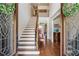 Grand two-story entryway with hardwood floors and staircase at 3215 Kylee Dawn Cir, Lawrenceville, GA 30045