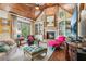Spacious Gathering room boasts a stone fireplace, built-in shelving, and comfortable seating at 3215 Kylee Dawn Cir, Lawrenceville, GA 30045