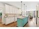 Updated kitchen with stainless steel appliances and a large island at 3215 Kylee Dawn Cir, Lawrenceville, GA 30045