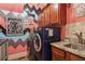 Convenient laundry room with cabinets, granite countertops, and a washer and dryer at 3215 Kylee Dawn Cir, Lawrenceville, GA 30045