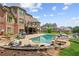 Luxury pool with spa and expansive patio area at 3215 Kylee Dawn Cir, Lawrenceville, GA 30045