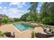 Resort-style pool with spacious patio and seating at 3215 Kylee Dawn Cir, Lawrenceville, GA 30045