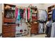 Large walk-in closet with ample shelving and hanging space for clothes at 3215 Kylee Dawn Cir, Lawrenceville, GA 30045