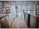 Modern kitchen with island, stainless steel appliances, and white cabinets at 412 Ashwood Sw Ave, Atlanta, GA 30315