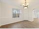 Bright dining room with hardwood floors and built-in cabinets at 2317 Rocksram Ct, Buford, GA 30519