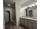 Elegant bathroom with double vanity, granite countertop, and a large walk-in shower at 3233 Greenhill Dr, Villa Rica, GA 30180