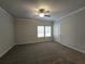 Spacious bedroom with neutral walls, carpet, and ceiling fan at 3233 Greenhill Dr, Villa Rica, GA 30180