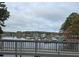 Lake view with numerous boats and docks on a cloudy day at 3233 Greenhill Dr, Villa Rica, GA 30180