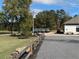 Golf carts parked near clubhouse with American flag at 3233 Greenhill Dr, Villa Rica, GA 30180